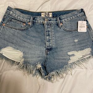 Free People distressed denim shorts